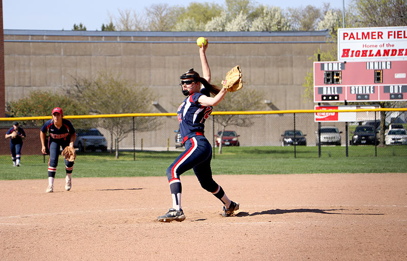 A photo of a MacMurray softball pitcher on the mound.